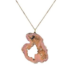 Necklace w/ orangish/pink stone/crystal with gold and tiny bit of purple